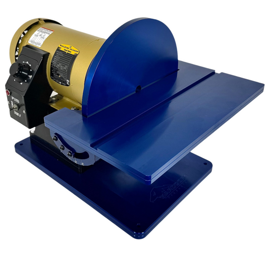 Angled front view of 12-inch disc grinder showing large precision disc and aluminum frame